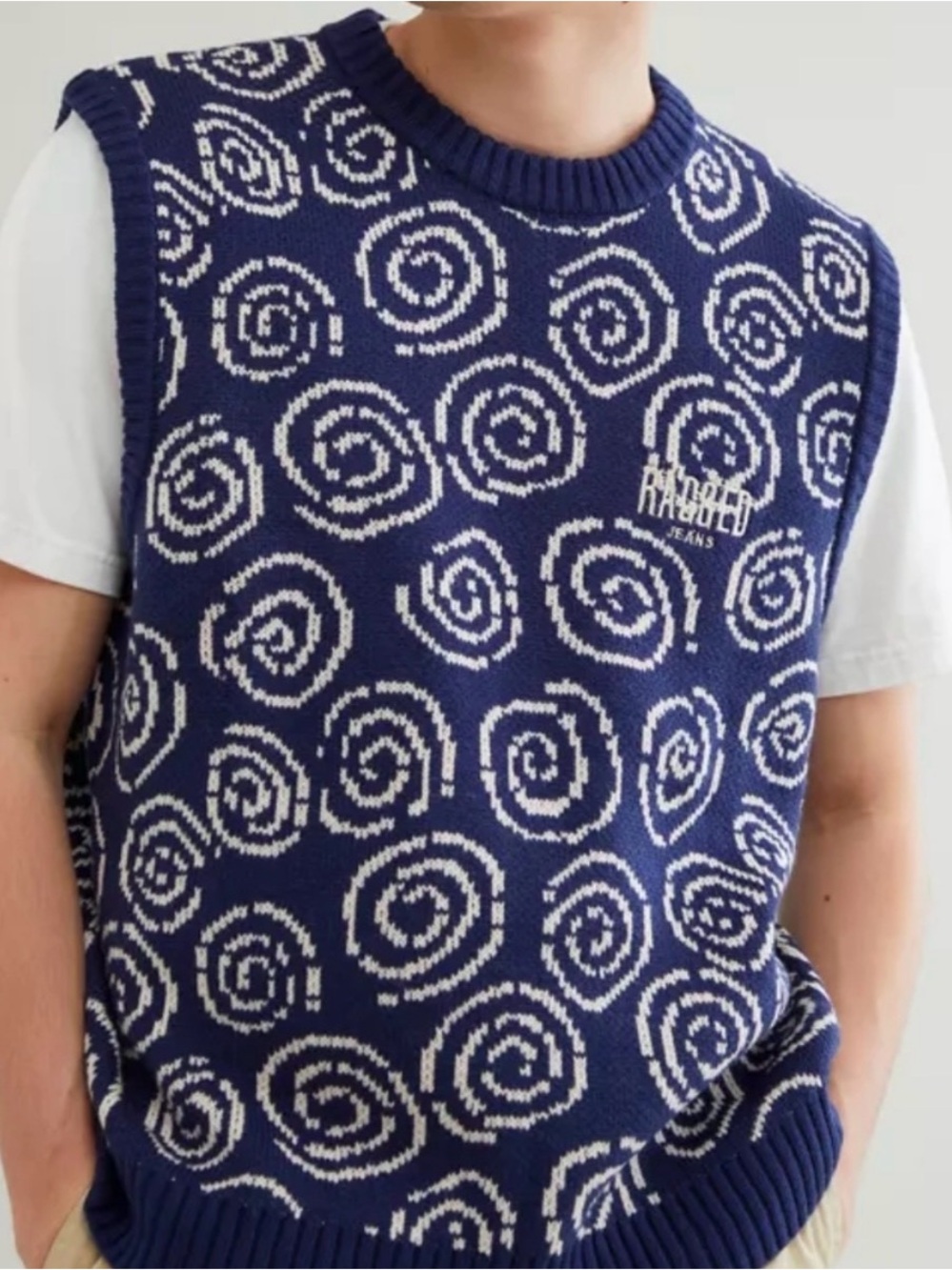 The Ragged Priest Confusion Sweater Vest in Blue Motif.